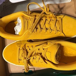 Yellow Pumas never worn